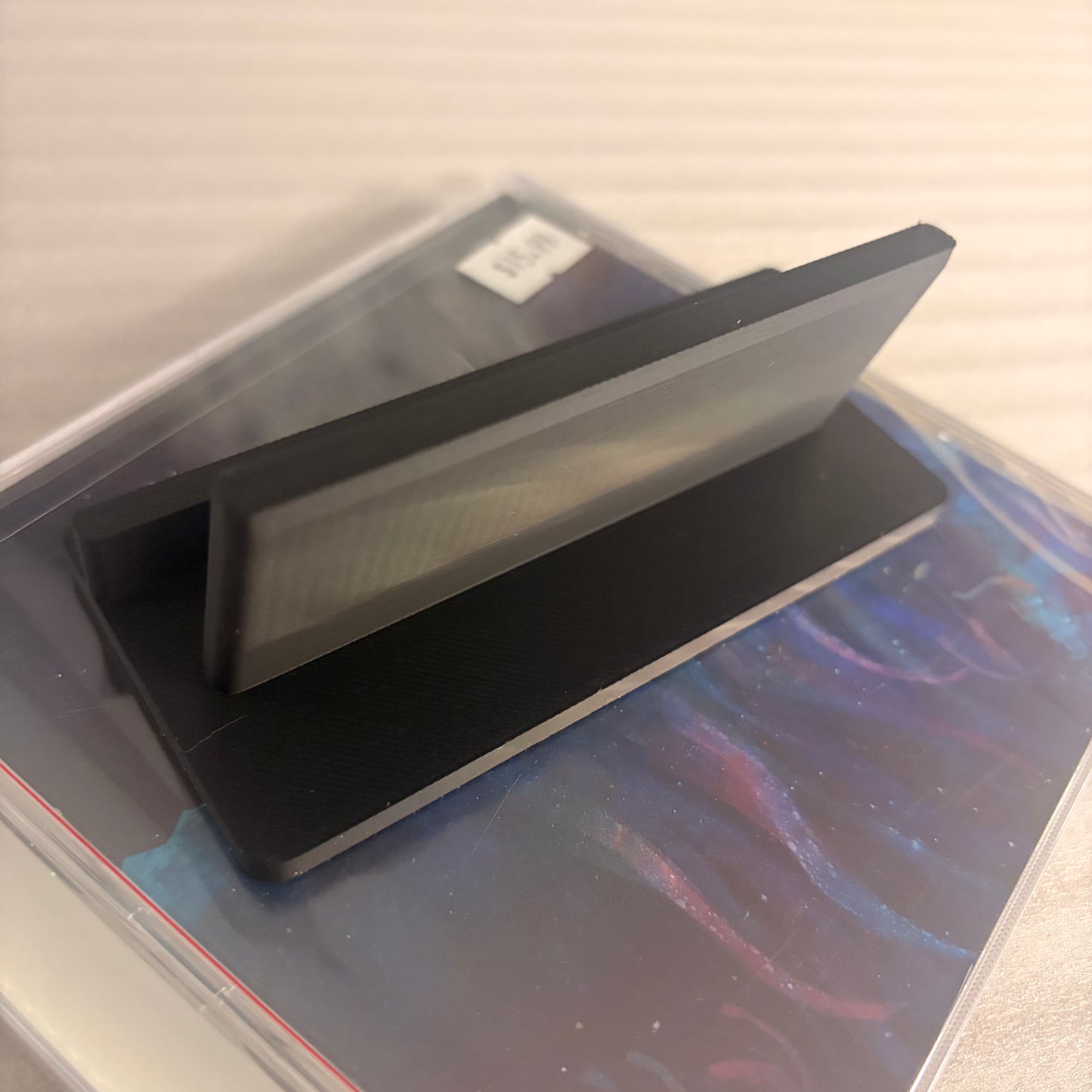 UNIVERSAL CD JEWEL CASE DISPLAY STAND – DARK ART APPAREL EXCLUSIVE