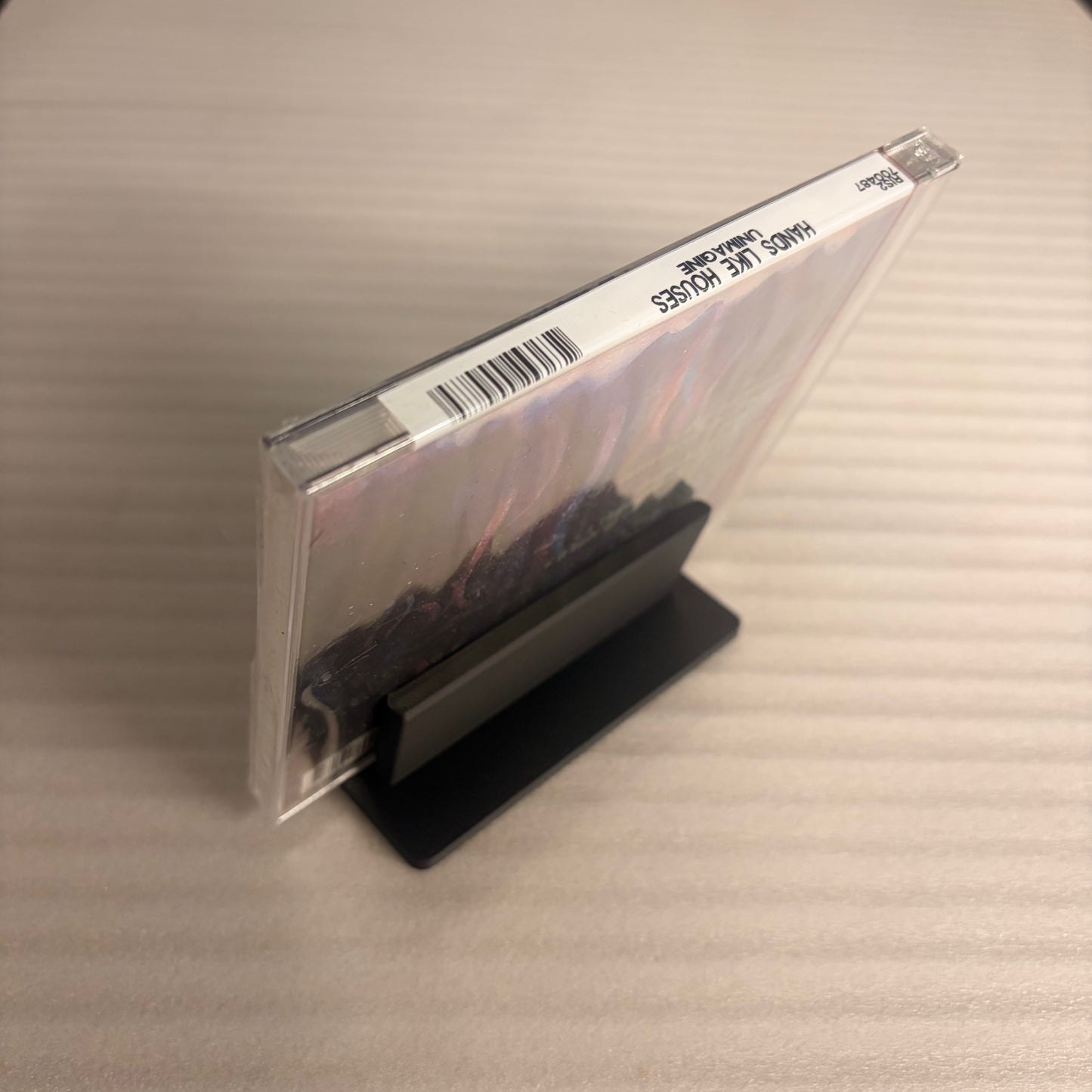 UNIVERSAL CD JEWEL CASE DISPLAY STAND – DARK ART APPAREL EXCLUSIVE